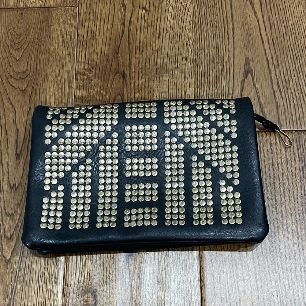 Leather clutch with gold studs